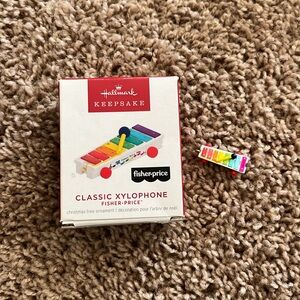 NIB Hallmark keepsake Fisher Price miniature xylophone ornament.